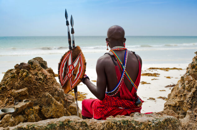 Maasai warrior holding spears and a shield