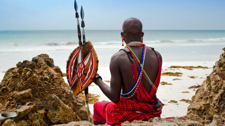 Maasai warrior holding spears and a shield